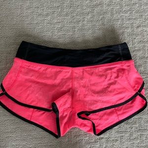 Bright pink Lululemon lined running shorts- size 6